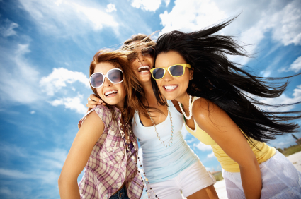 Women are smiling after cosmetic dentistry treatments at Jon C. Packman DDS in Statesville, NC.
